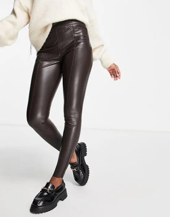faux leather skinny pants in brown
