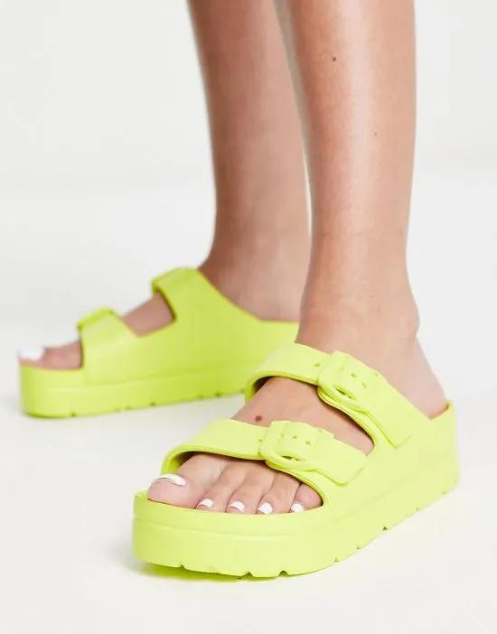 Fawn flatform jelly mules in lime