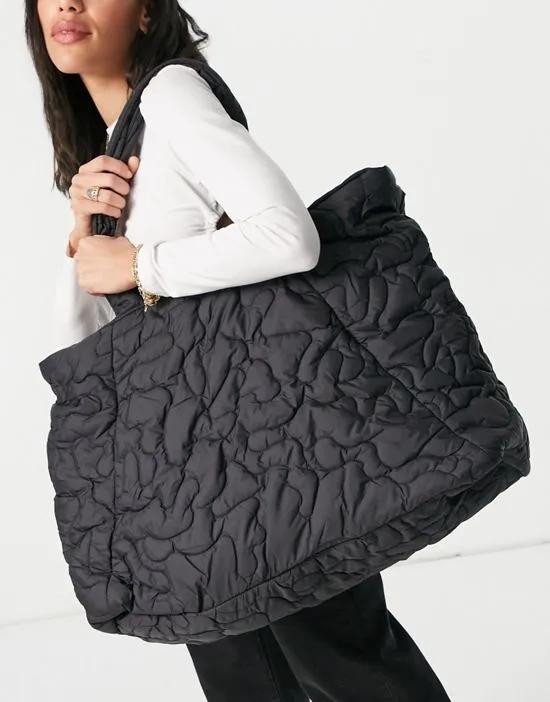 Femme oversized quilted bag in black