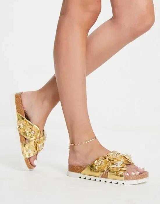 Figgy cross strap floral flat sandals in gold