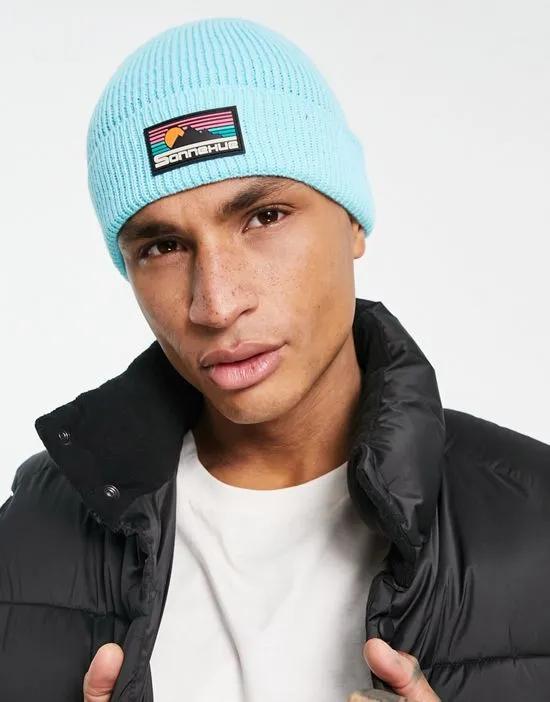 fisherman beanie with rubber logo in light blue