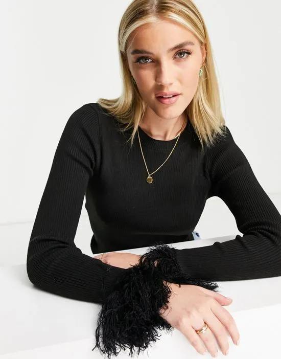 fitted ribbed sweater with fluffy cuffs in black