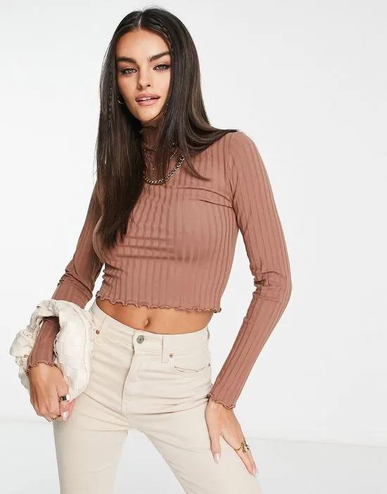 fitted ribbed top with lettuce hem in neutral