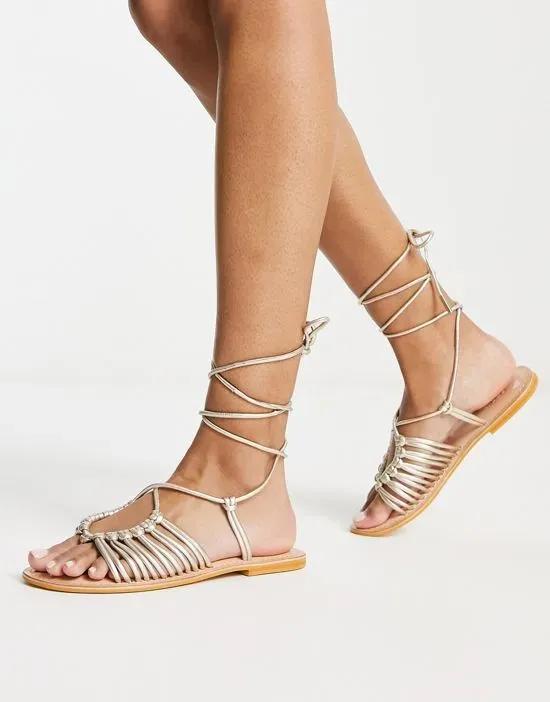 Fizz Leather knotted strappy flat sandal in gold