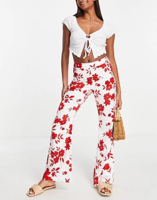 flared pants in red floral print - part of a set