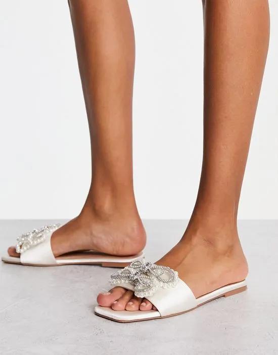 Flo embellished bow flat sandal in ivory