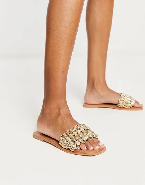 Flora woven flat sandals in gold