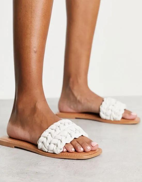 Flora woven flat sandals in white