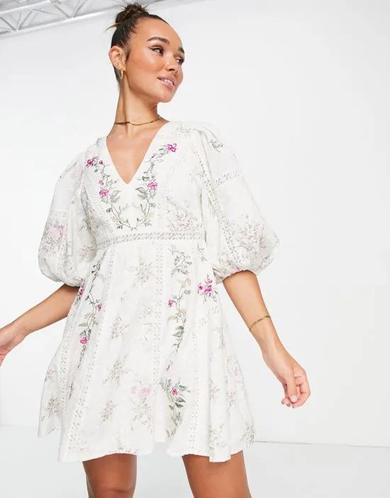 floral embroidered mini dress with lace inserts in cream