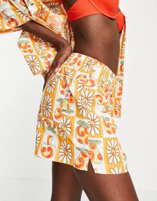 flower print shorts in orange - part of a set