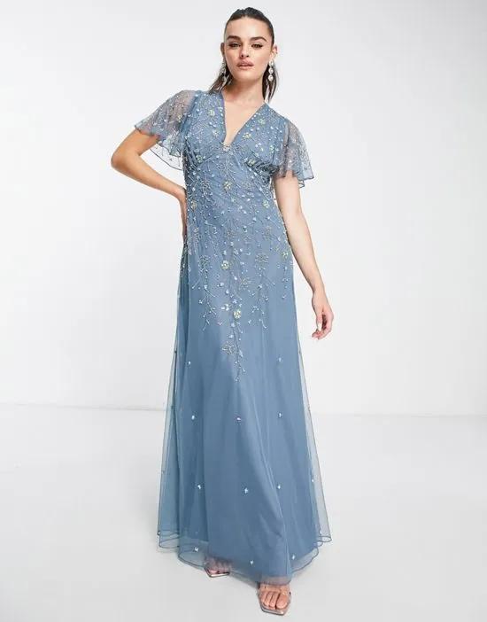flutter sleeve maxi dress with trailing floral embellishment in blue