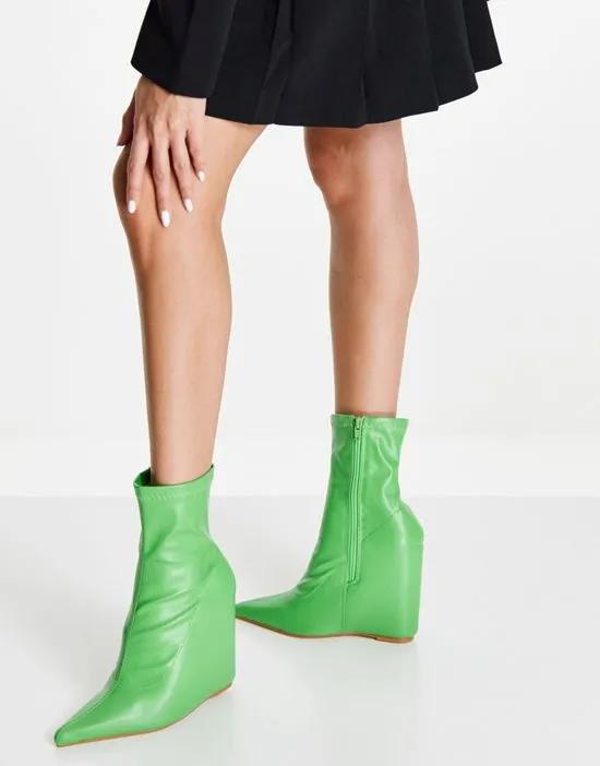 Getaway wedge heel sock boots in green