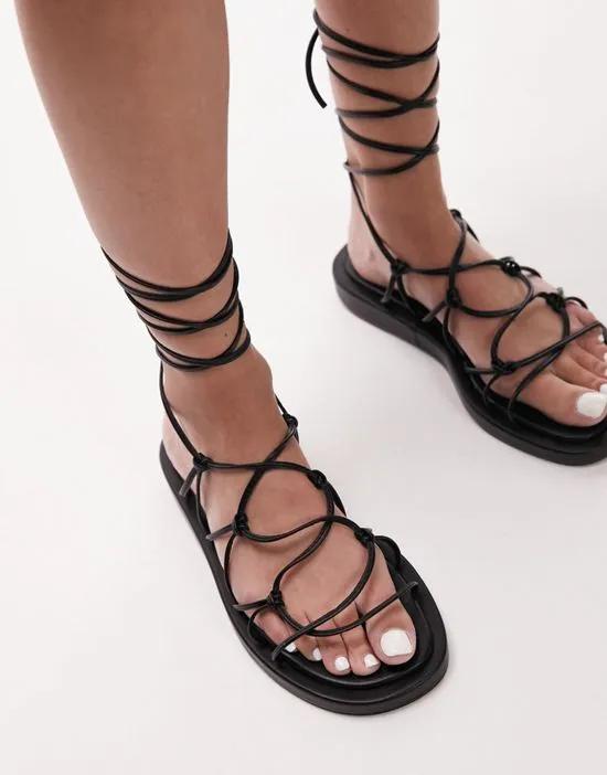 Gina strappy flat sandals with ankle tie in black