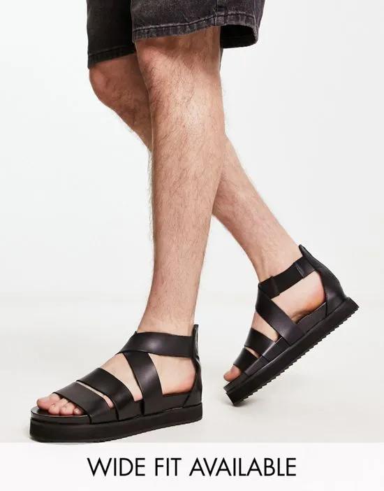 gladiator sandals in black leather with chunky sole