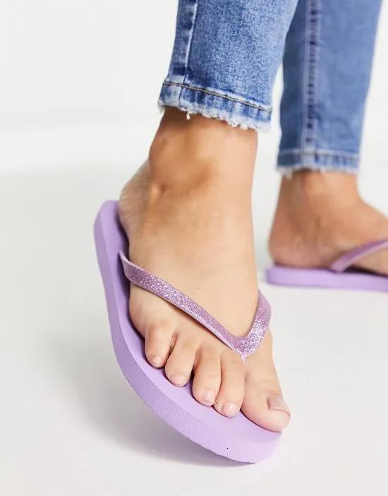 glitter flip flops in lilac