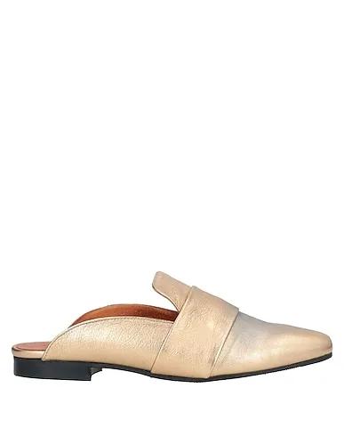 Gold Mules and clogs