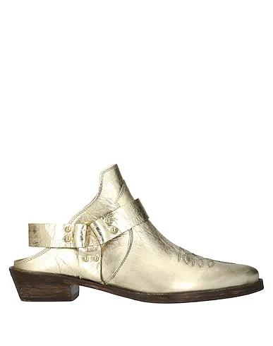 Gold Mules and clogs