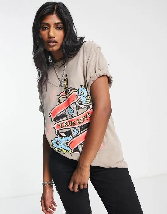 graphic T-shirt with hot fix true love dagger in stone