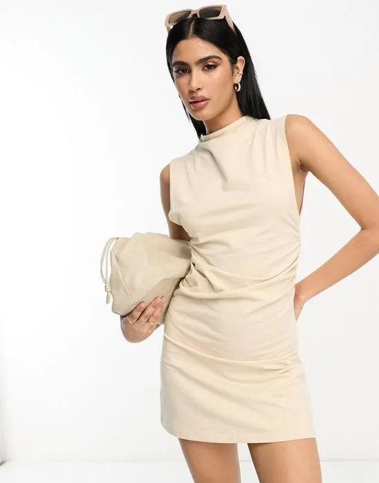 grown on neck mini dress with ruched sides in stone