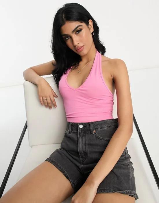 halter neck crop top in bright pink