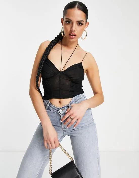 halter top with ruching and mesh panel in black