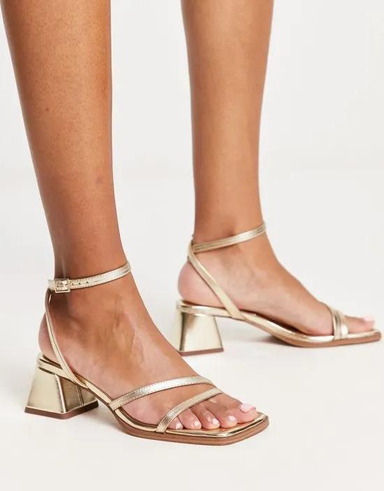 Hastings mid block heel sandals in gold