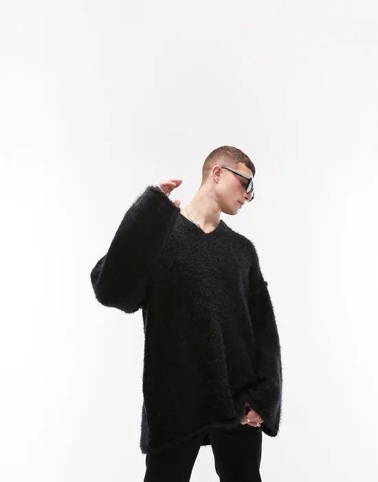 heavy knit oversized v neck sweater in washed black