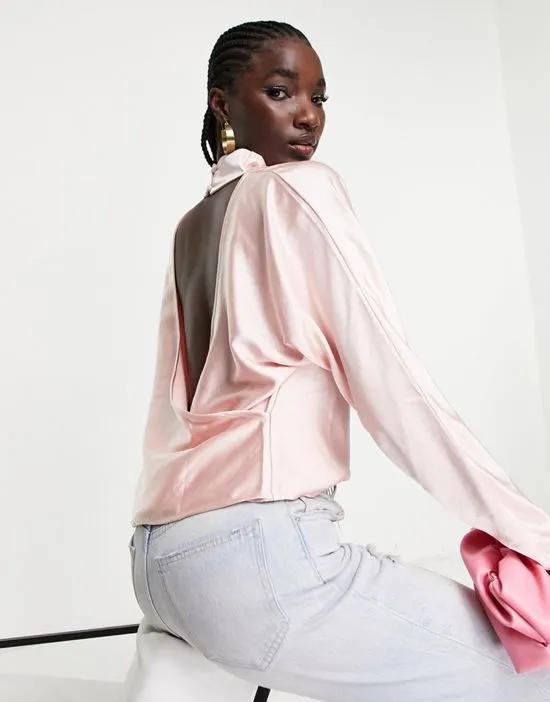high neck backless blouse in blush pink