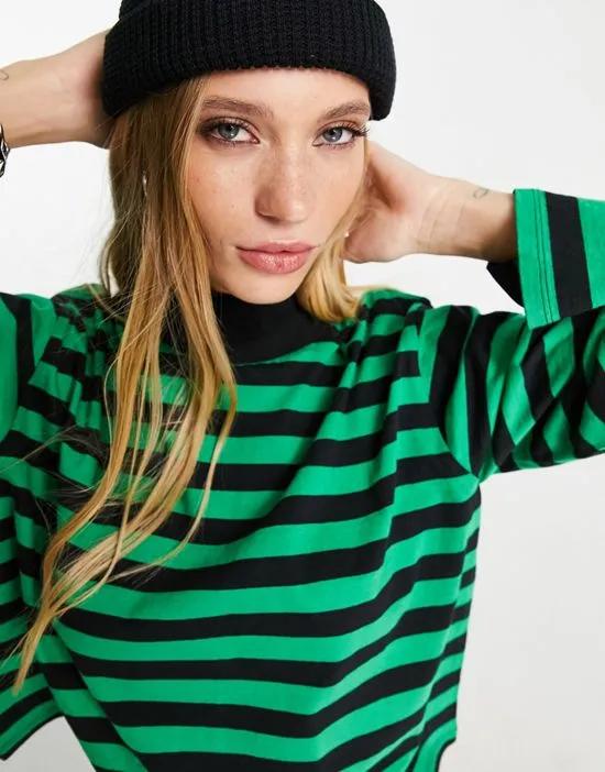 high neck boxy long sleeve top in black and green stripe