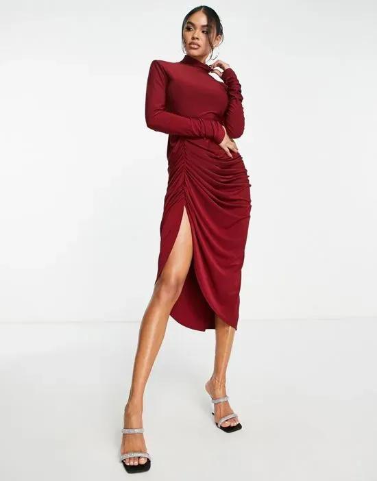 high neck ruched midi dress with thigh split in red