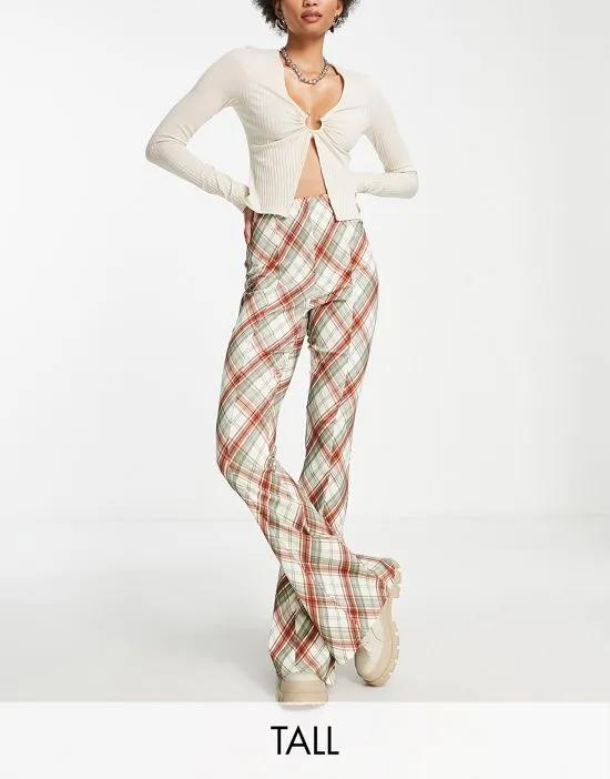 high rise bengaline flared pants with side slits in plaid print