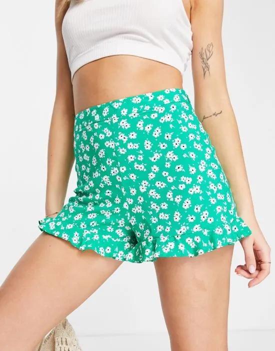 high rise frill short in ditsy green print