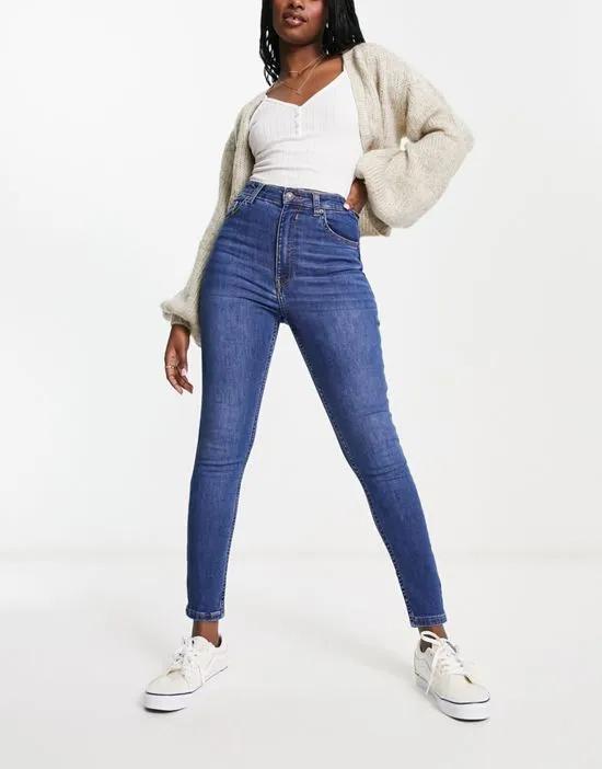 high waist ankle length skinny jean in mid blue