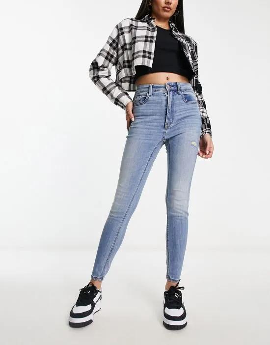 high waist skinny jeans in medium blue
