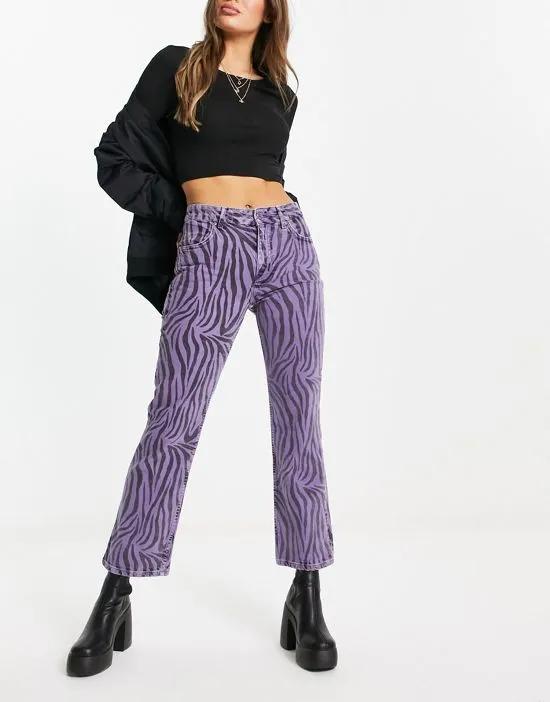 high waisted jeans in purple zebra