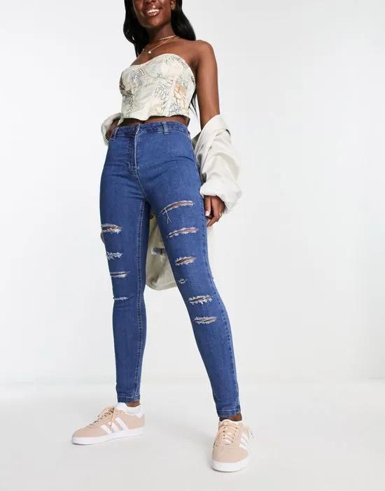 high waisted multi rip skinny jeans in mid blue