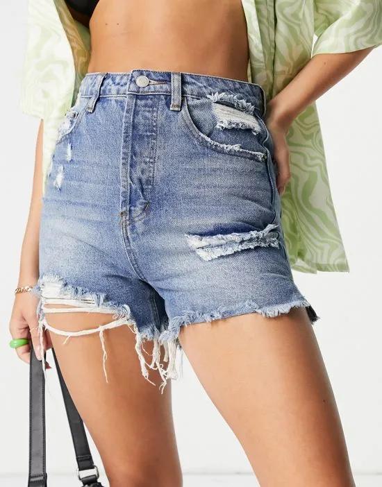 high waisted ripped denim shorts in mid wash