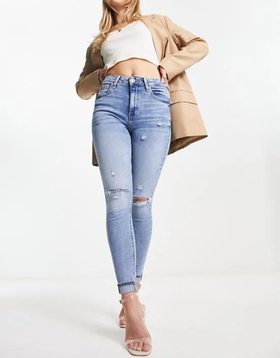 high waisted ripped skinny jean in medium blue