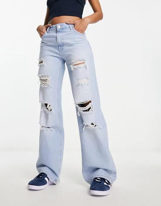 high waisted ripped ultra wide leg jeans in bleach wash