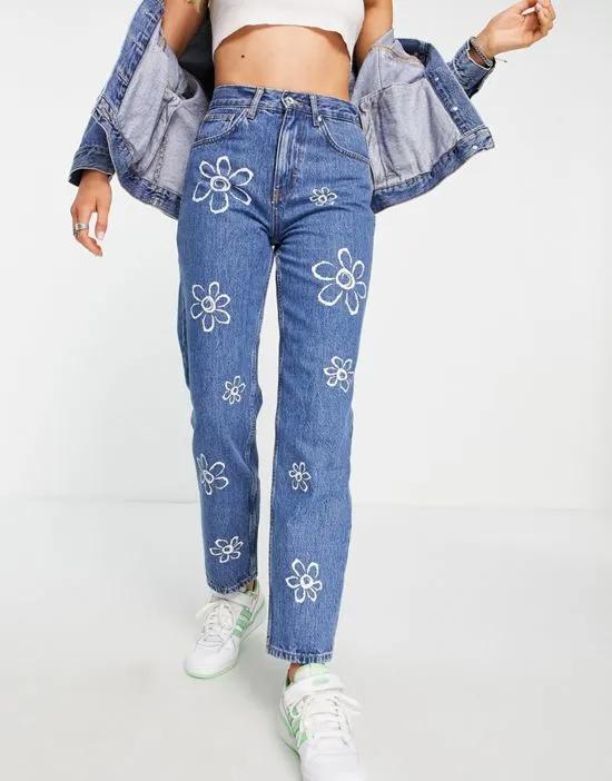 high waisted straight leg jean with flower print in light blue