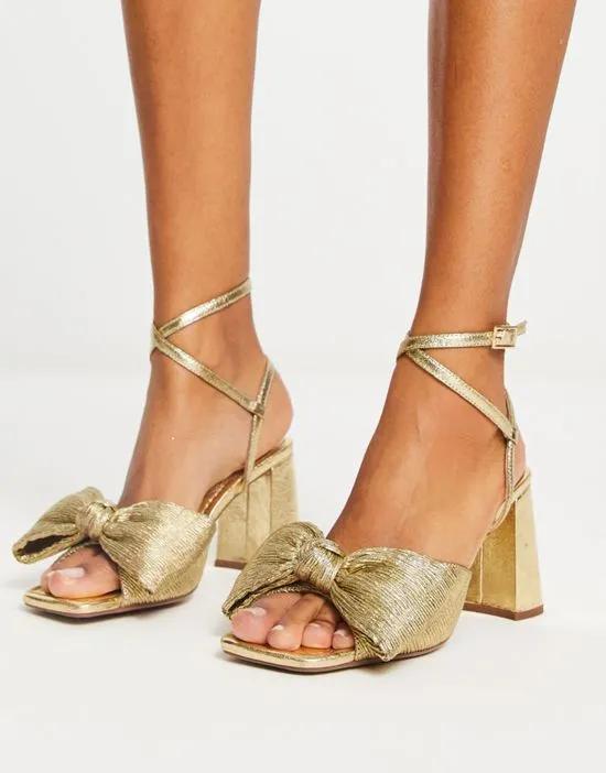 Hitched bow detail mid heeled sandals in gold