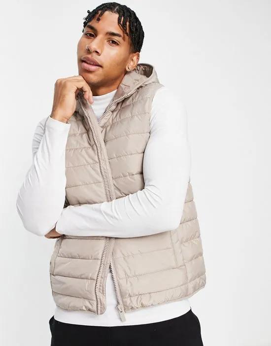 hooded puffer vest in stone