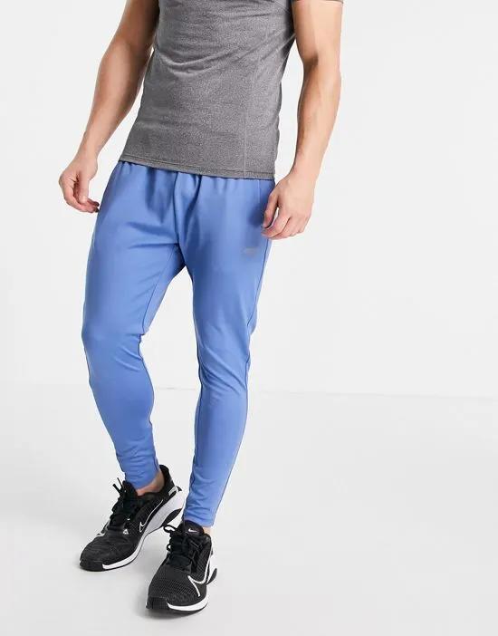 icon super skinny training sweatpants with quick dry in blue