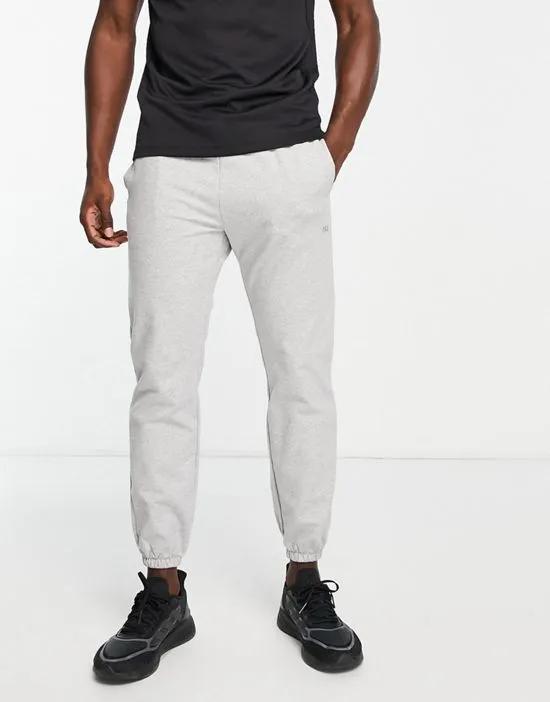 icon training sweatpants with tapered fit in gray marl