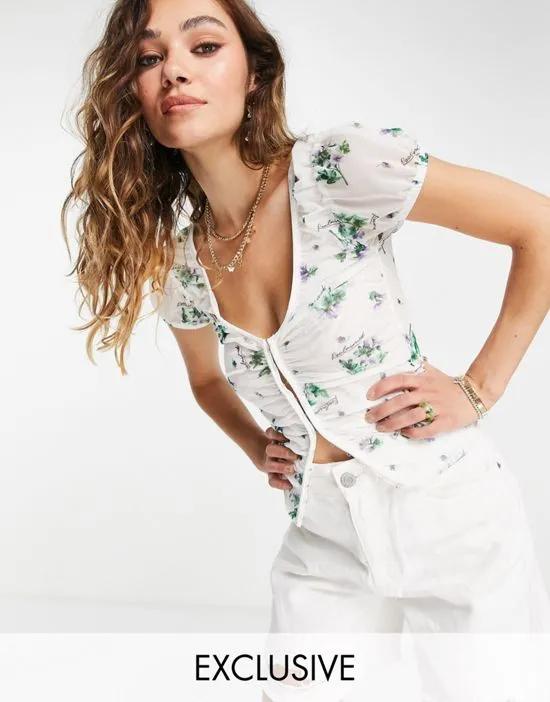 Inspired ruched mesh top in floral print