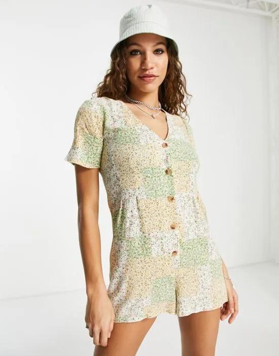 inspired slouchy romper in patchwork floral print