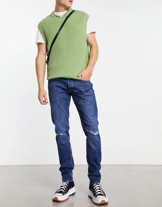 Intelligence glenn slim fit super stretch jean with rips in mid wash blue