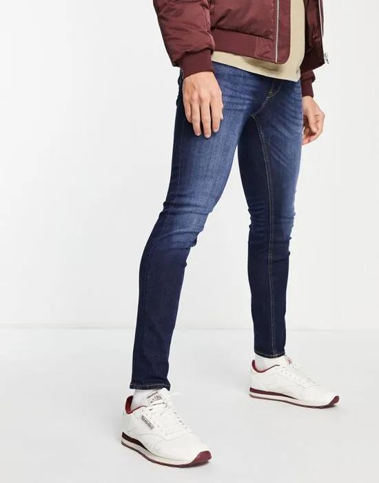 Intelligence Liam skinny fit jeans in mid blue wash