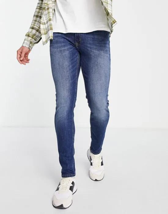 Intelligence Liam skinny fit stretch jeans in mid blue
