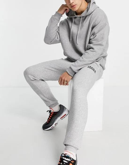 Intelligence sweatpants in slim fit with logo in light gray
